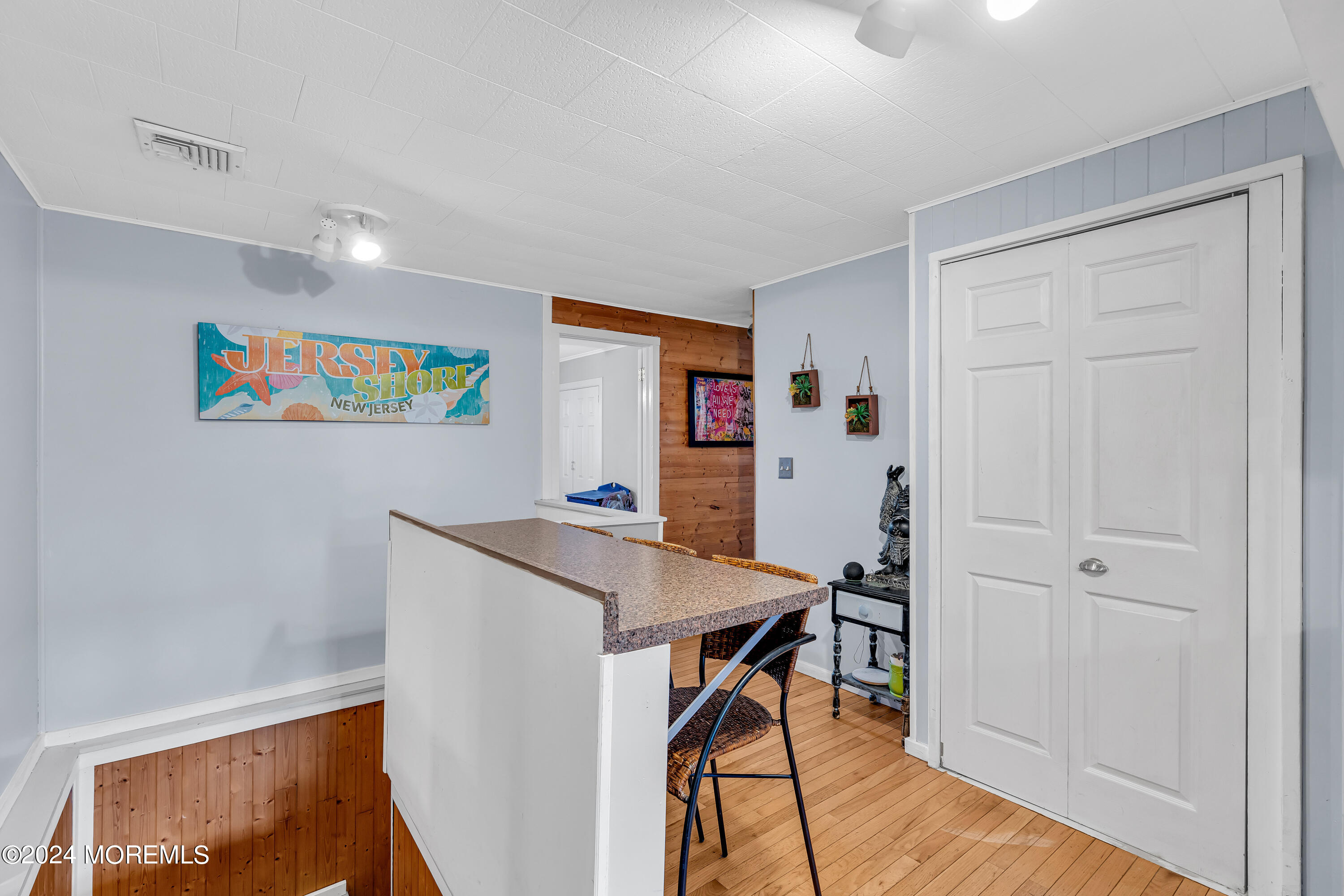 13 Hemlock Road Howell, NJ 07731 - Photo 20 of 48 a view of a dining hall with a dining table and chairs