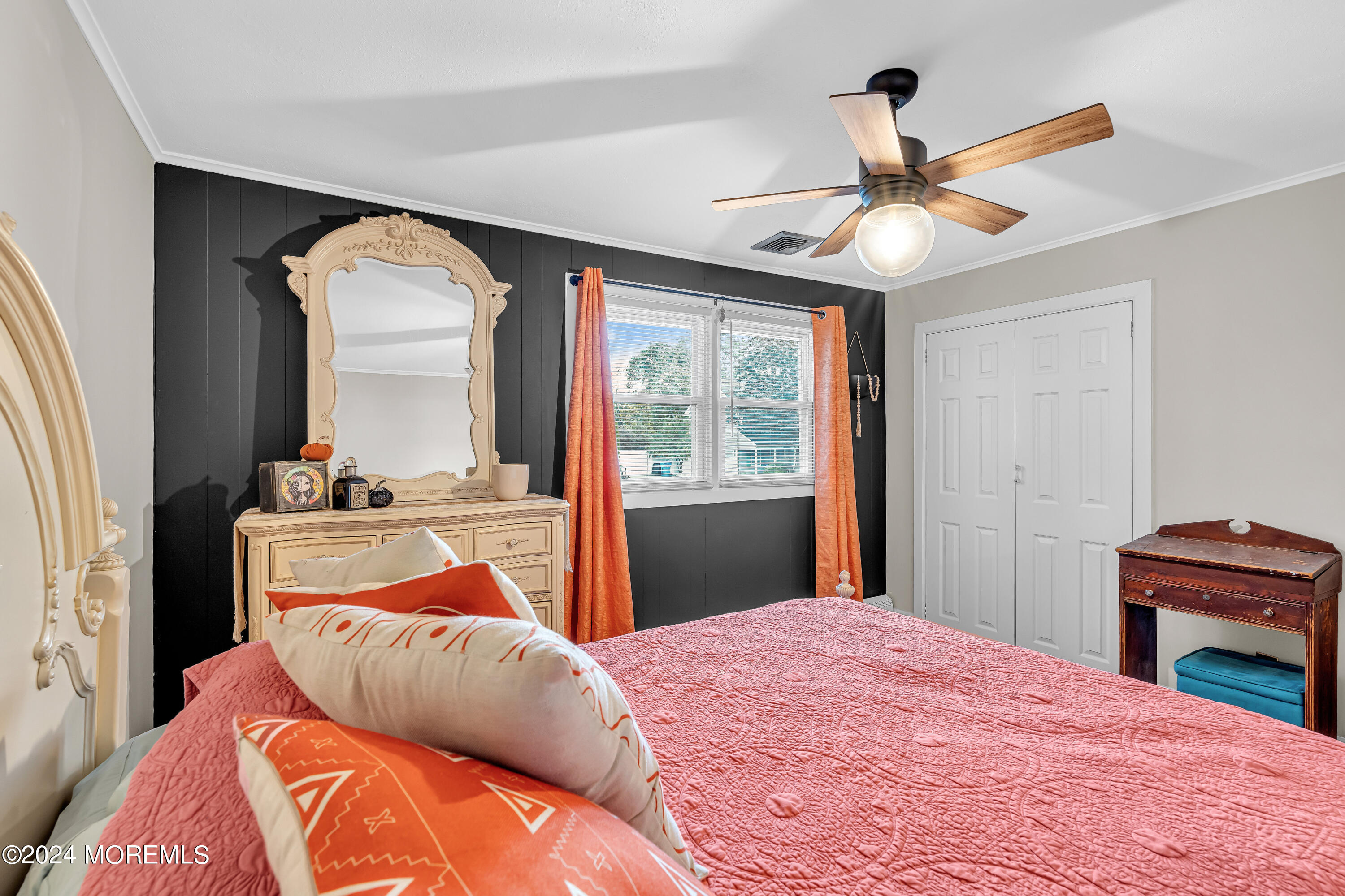 13 Hemlock Road Howell, NJ 07731 - Photo 23 of 48 a bedroom with a large bed and a chandelier