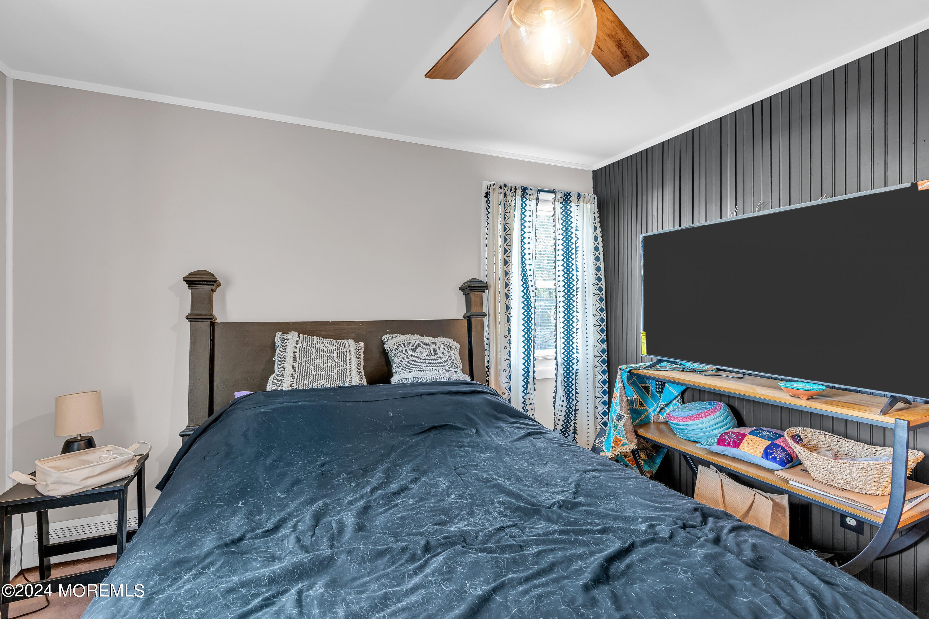 13 Hemlock Road Howell, NJ 07731 - Photo 27 of 48 a bedroom with furniture and a flat screen tv