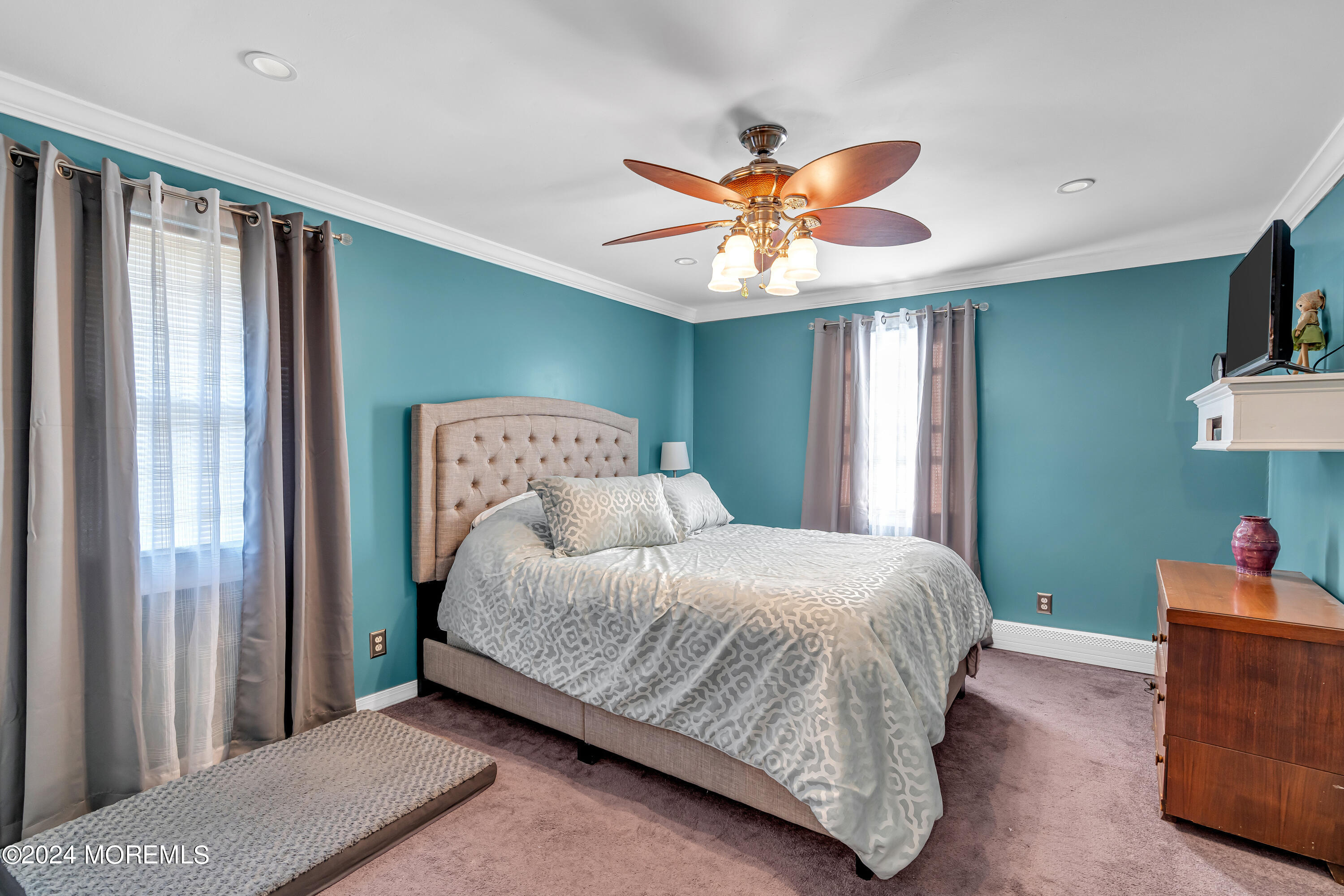 13 Hemlock Road Howell, NJ 07731 - Photo 28 of 48 a bedroom with a bed and a chandelier