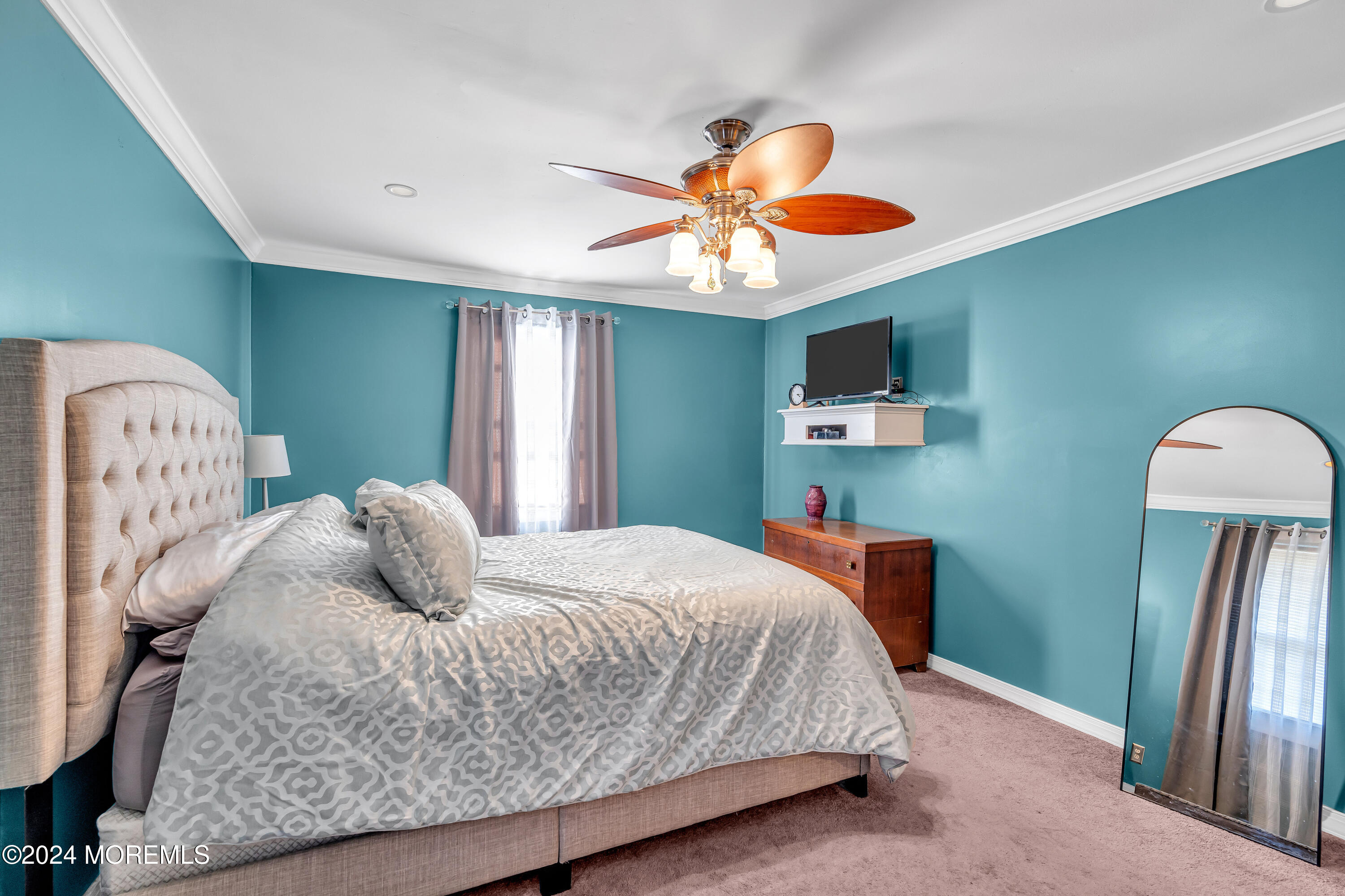 13 Hemlock Road Howell, NJ 07731 - Photo 30 of 48 a bedroom with a bed and a chandelier