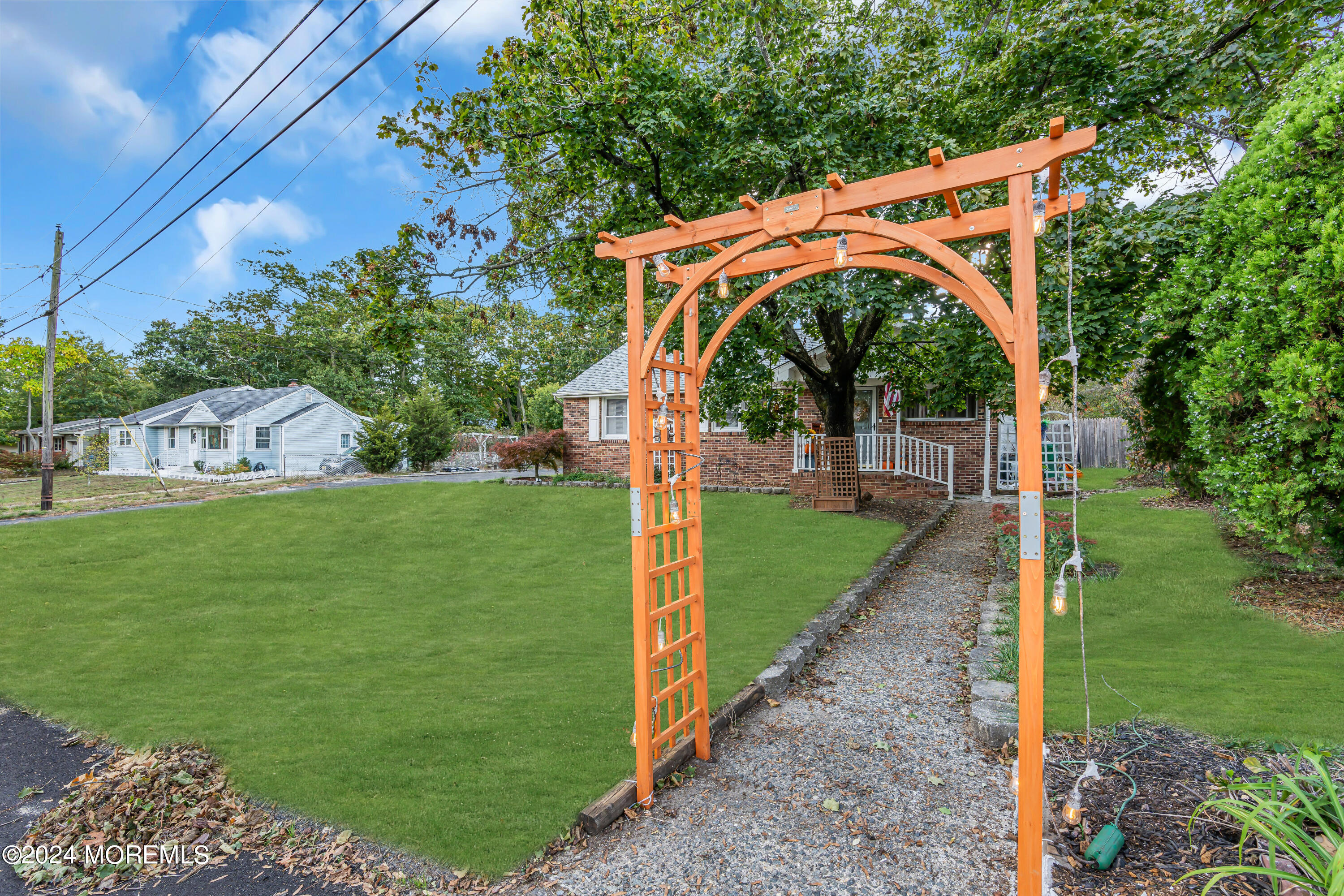 13 Hemlock Road Howell, NJ 07731 - Photo 35 of 48 a view of a yard with a trees