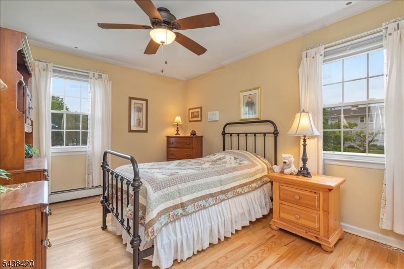 79 Main Street Califon, NJ 07830 - Photo 25 of 50 a bedroom with a bed and wooden floor