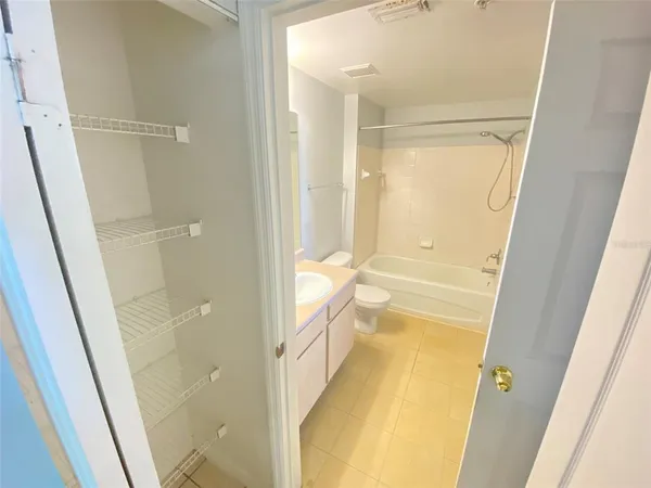 a bathroom with a tub and shower