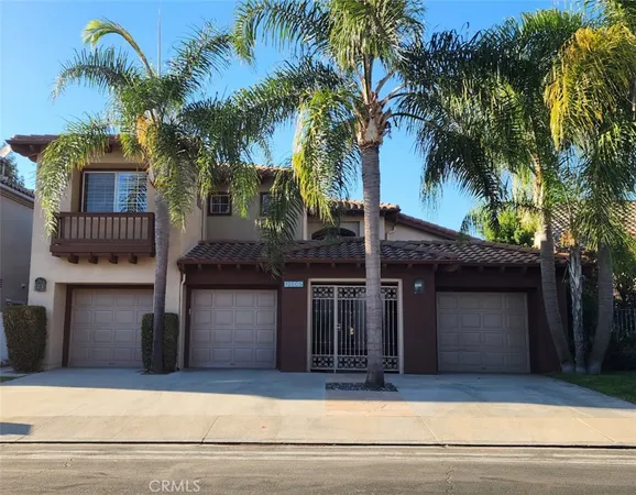 a front view of a house with a garage