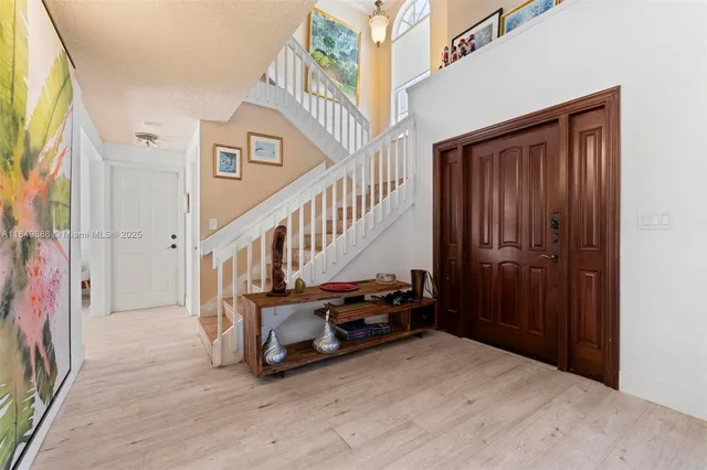 a view of an entryway with staircase