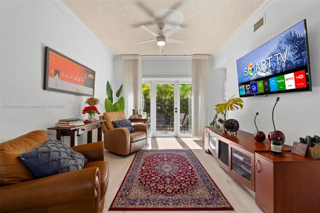 a living room with furniture and a rug