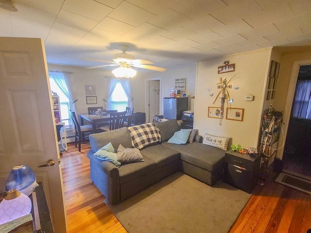 153 Field Street Fall River, MA 02721 - Photo 8 of 9 a living room with furniture and a fireplace