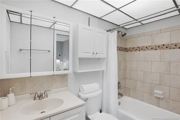 a view of a backyard with a patio