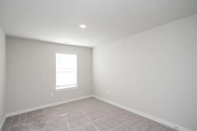 an empty room with window