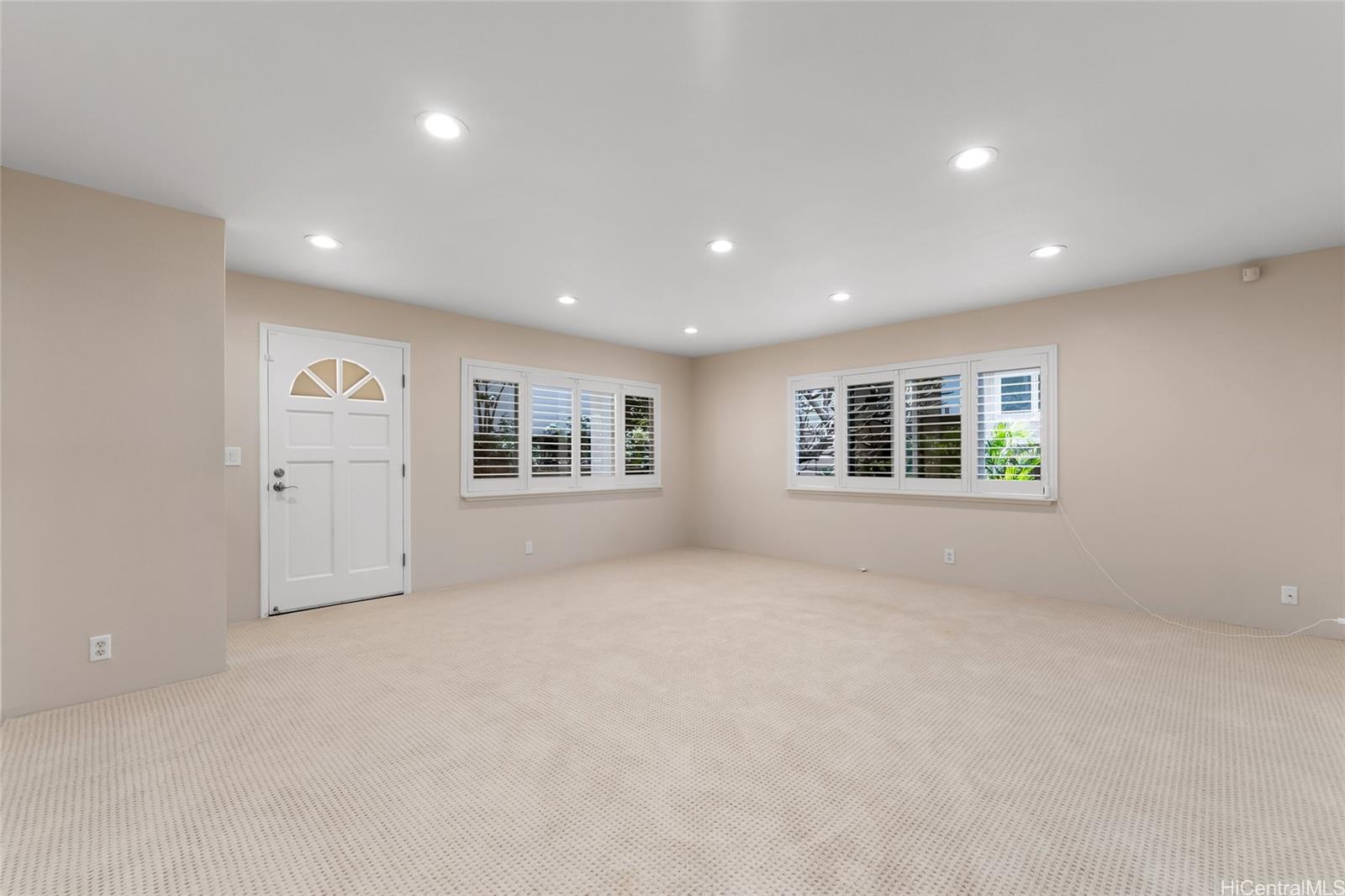 4562 Malia Street Honolulu, HI 96821 - Photo 18 of 25 an empty room with windows