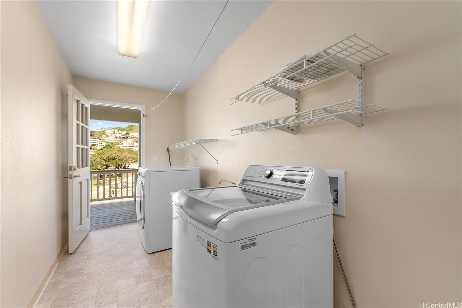 4562 Malia Street Honolulu, HI 96821 - Photo 20 of 25 a utility room with dryer and washer