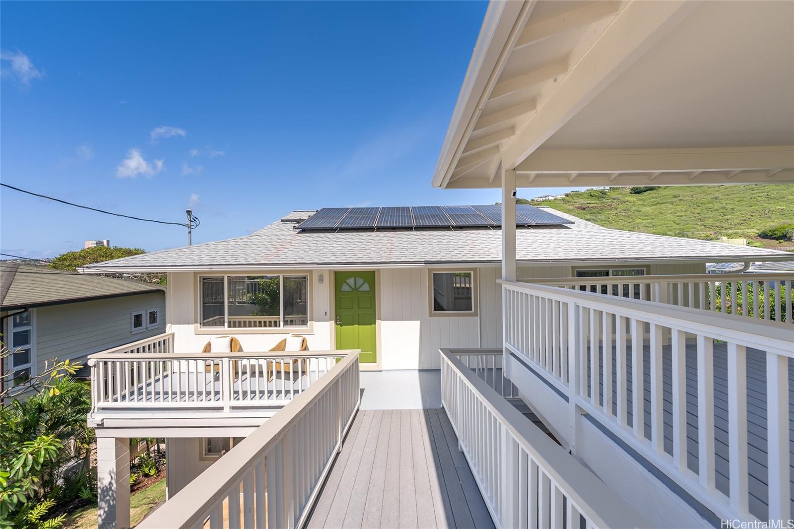 4562 Malia Street Honolulu, HI 96821 - Photo 2 of 25 a view of a house with a wooden deck