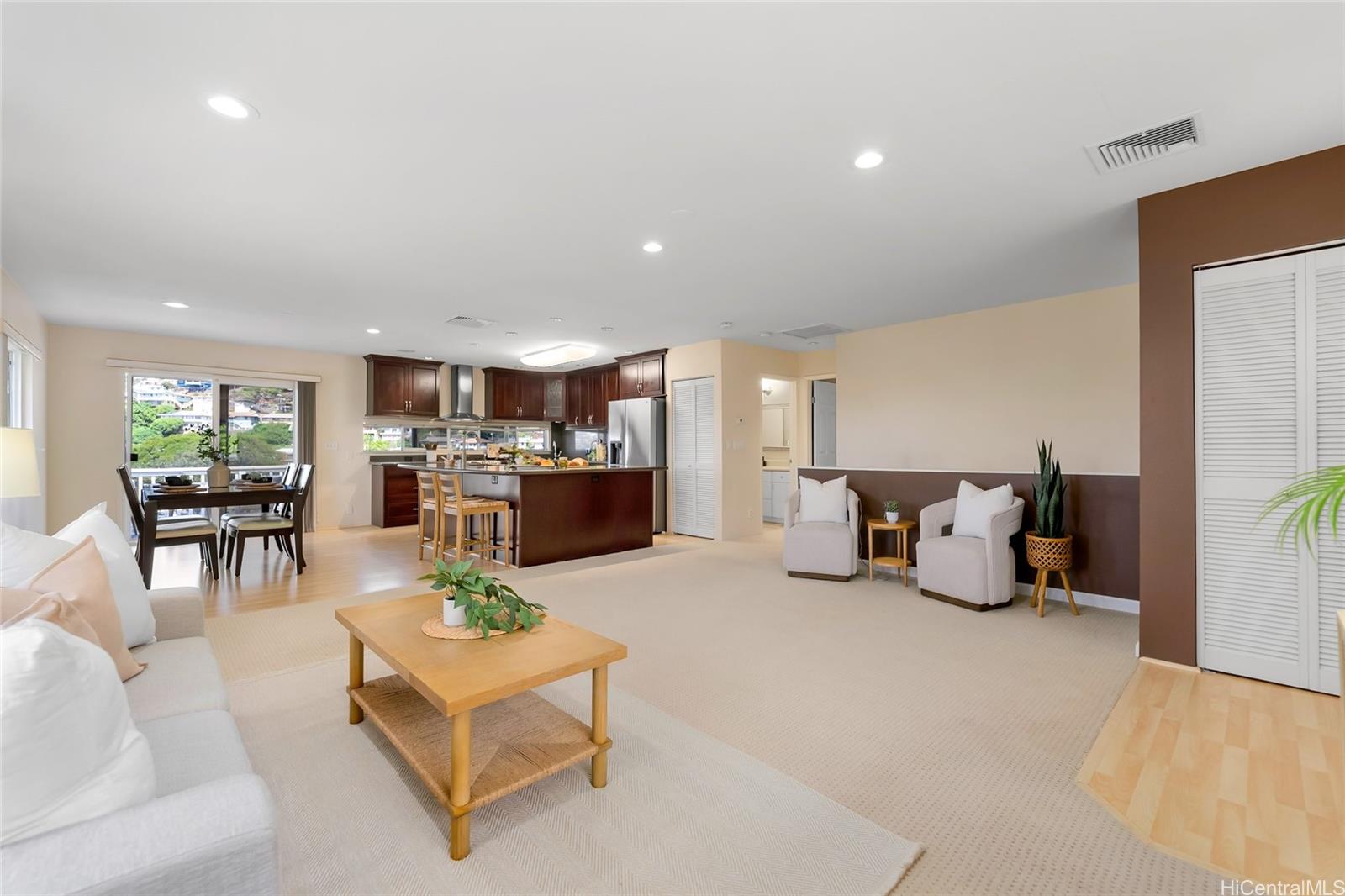 4562 Malia Street Honolulu, HI 96821 - Photo 5 of 25 a living room with furniture and a table