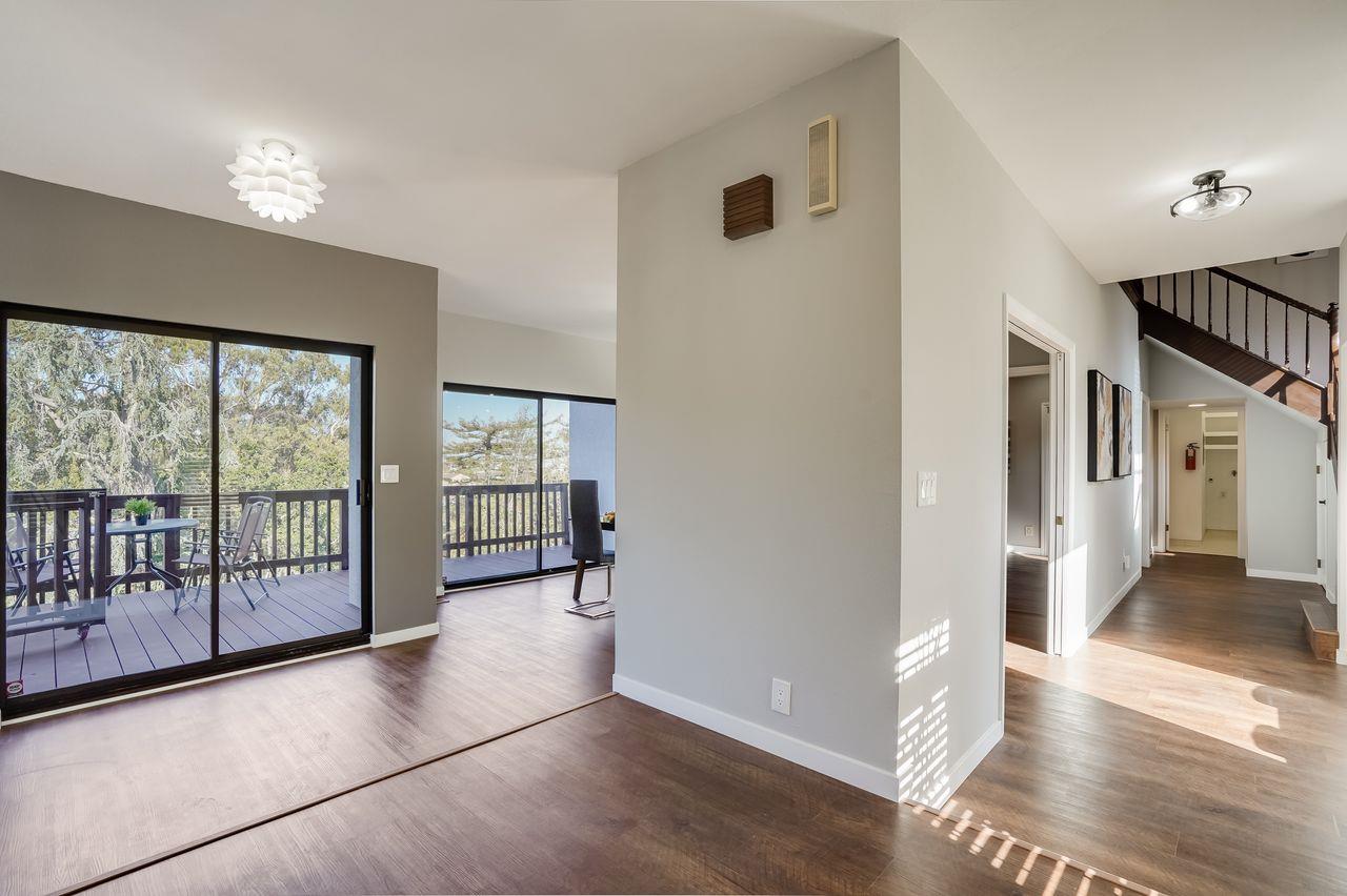 1176 Millbrae Avenue Millbrae, CA 94030 - Photo 2 of 47 a view of a big room with wooden floor and windows