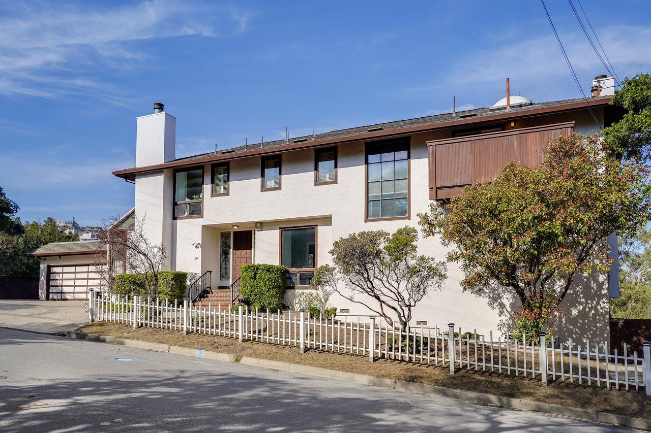 1176 Millbrae Avenue Millbrae, CA 94030 - Photo 5 of 47 a front view of a house with a garden