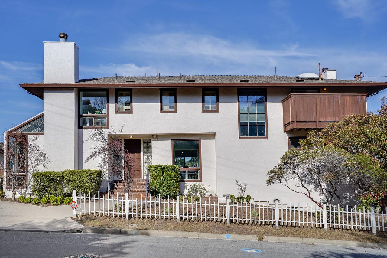 1176 Millbrae Avenue Millbrae, CA 94030 - Photo 9 of 47 a front view of a house with a yard