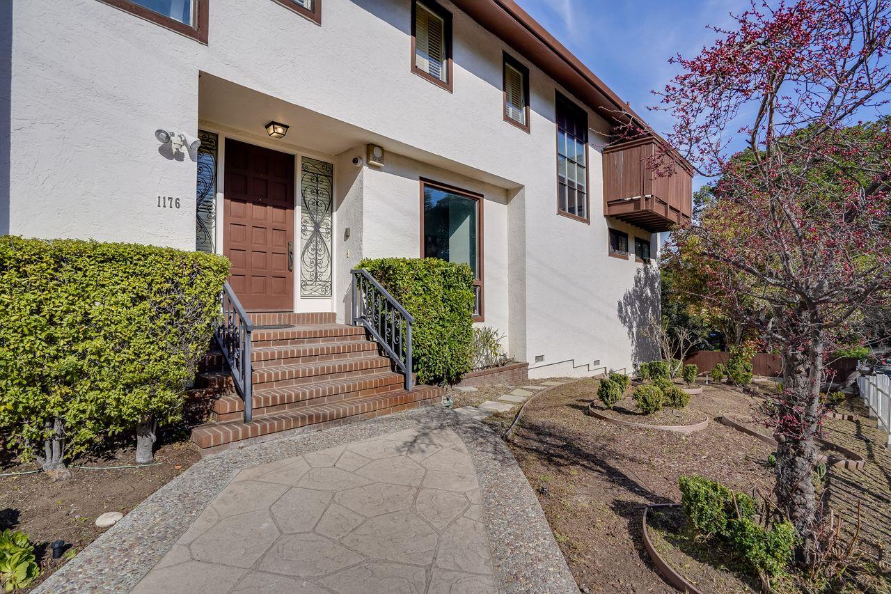 1176 Millbrae Avenue Millbrae, CA 94030 - Photo 10 of 47 a front view of a house with a yard