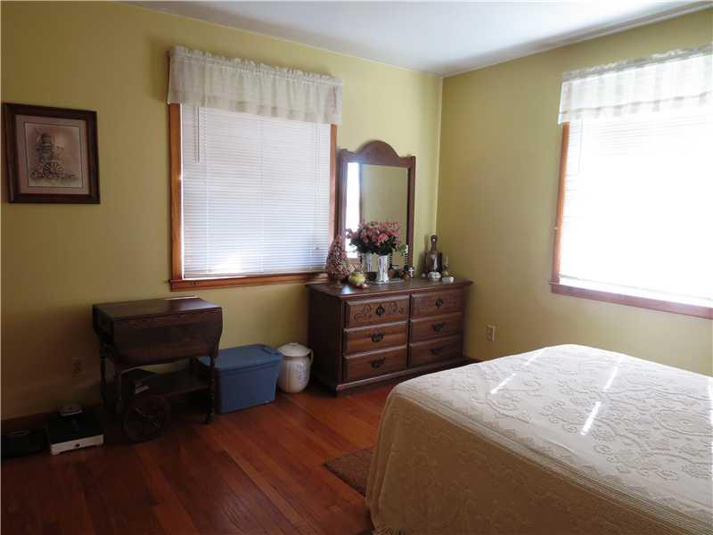 3022 River Road Vandergrift, PA 15690 - Photo 9 of 13 Bedroom. The guest bedroom is equally spacious as the master bedroom and has the same beautiful hardwood floors and plenty of natural light.