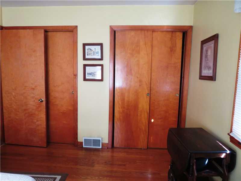 3022 River Road Vandergrift, PA 15690 - Photo 10 of 13 Bedroom. In the second bedroom, the closet space is generous indeed, and the wood of the floor and doors makes for a very warm space.