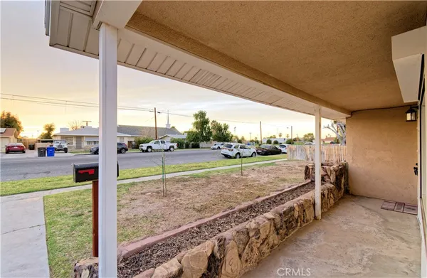 a view of a porch with a yard