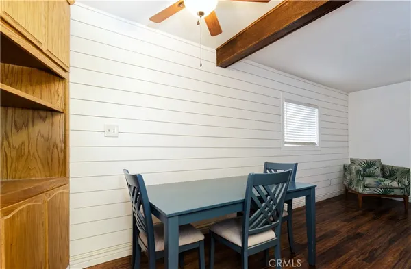 a view of a outdoor seating area with wooden floor