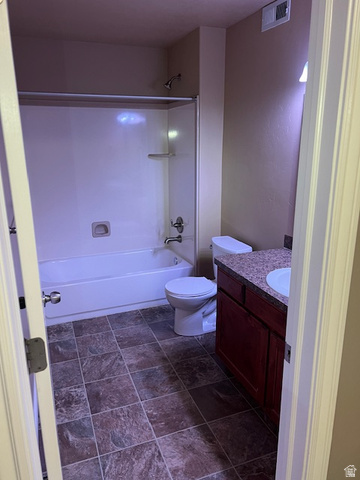 917 South Main Street, Unit H Layton, UT 84041 - Photo 10 of 19 Full bath with vanity, bathing tub / shower combination, and stone finish floors