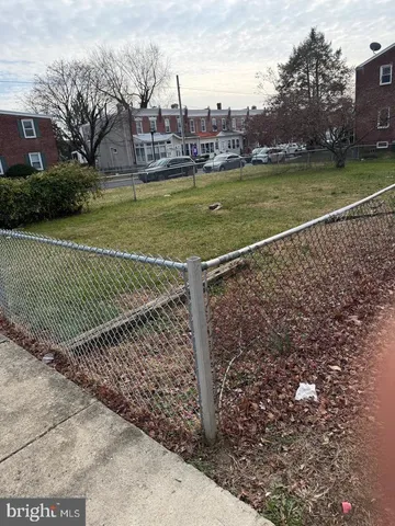 a view of a fountain in front of a house