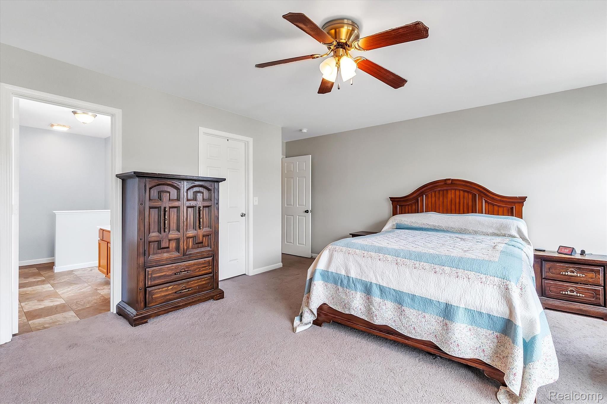 749 Dewars Street Howell, MI 48843 - Photo 20 of 39 View of primary bedroom with en-suite full bath on second floor