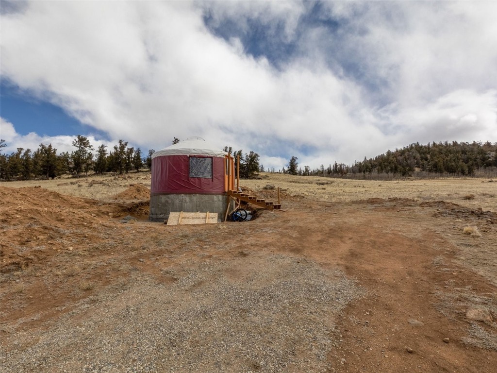 1642 Longbow Drive Como, CO 80432 - Photo 13 of 13 a view of a field with trees in the background