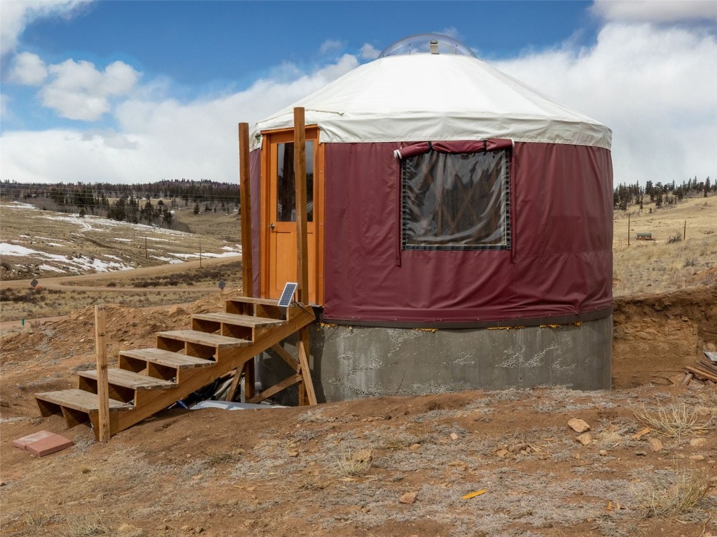 1642 Longbow Drive Como, CO 80432 - Photo 3 of 13 a view of a terrace with chairs