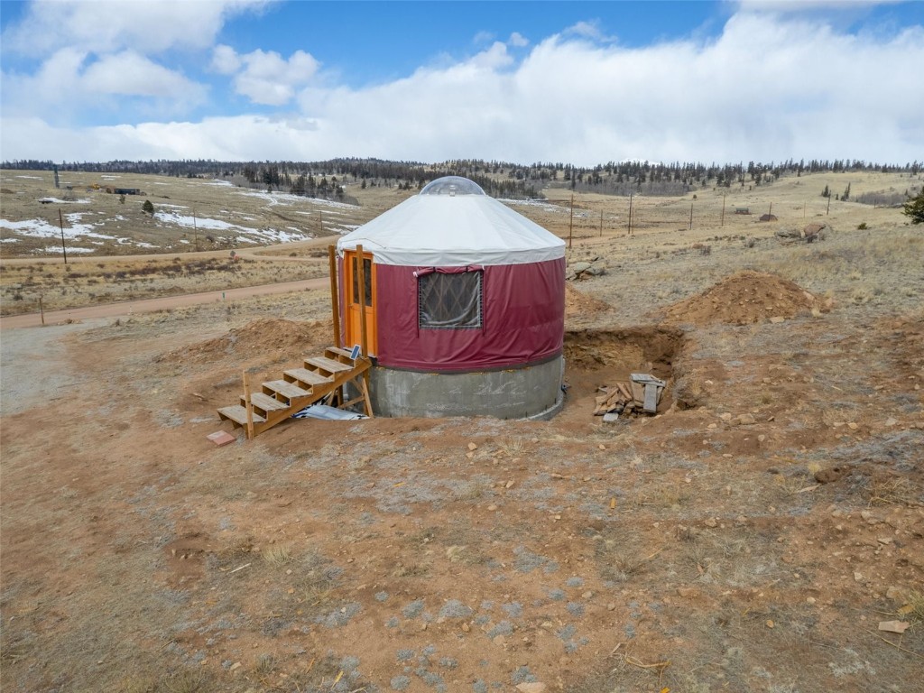 1642 Longbow Drive Como, CO 80432 - Photo 4 of 13 a view of a lake with a beach