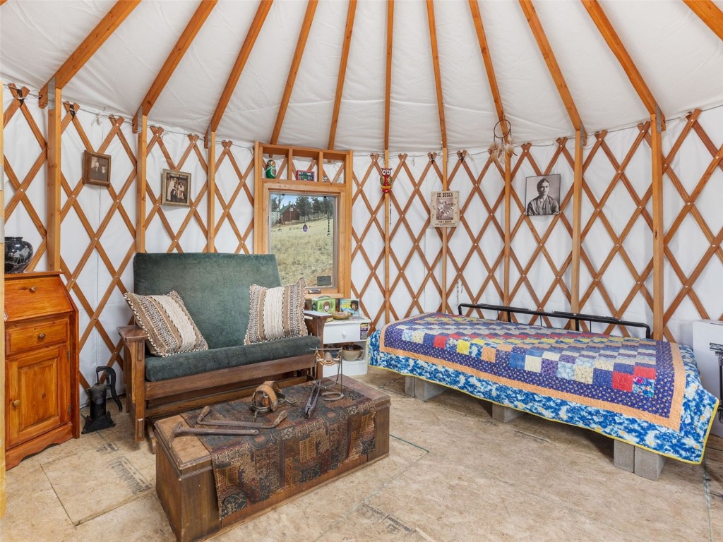 1642 Longbow Drive Como, CO 80432 - Photo 5 of 13 a living room with furniture and a couch