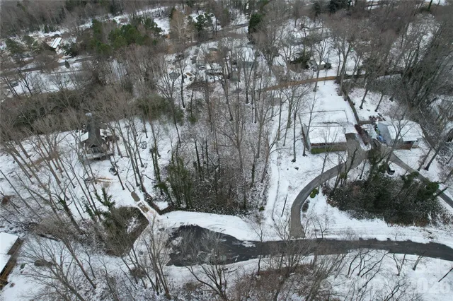 a view of a backyard of the house