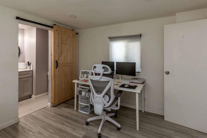 2151 Oakland Road, Unit 297 San Jose, CA 95131 - Photo 12 of 34 a view of a workspace with furniture and wooden floor