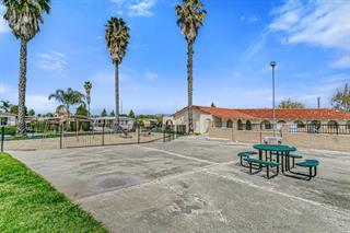 2151 Oakland Road, Unit 297 San Jose, CA 95131 - Photo 30 of 34 a view of a patio with a table and chairs