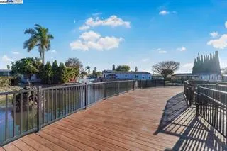 a view of a golf course with a lake