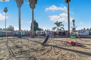 2151 Oakland Road, Unit 297 San Jose, CA 95131 - Photo 33 of 34 a view of a park with swings