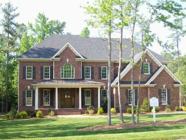 3928 Bending Birch Drive Raleigh, NC 27613 - Photo 1 of 10 Executive three sided brick home with 3 car side load garage, awesome .60 acre flat lot. Exterior Front
