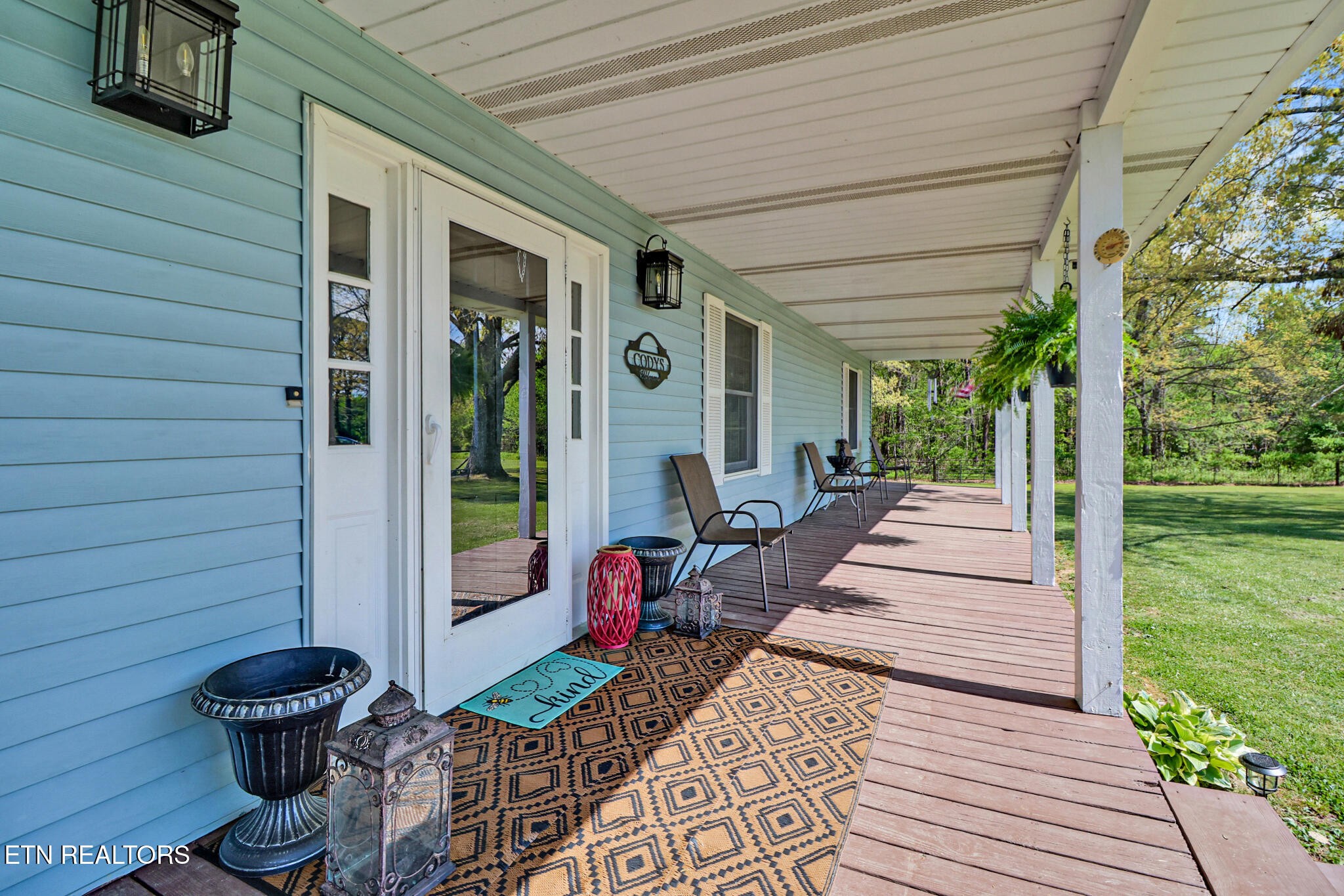 220 Old Gatewood Ford Road Jamestown, TN 38556 - Photo 13 of 57 a front view of a house with a porch