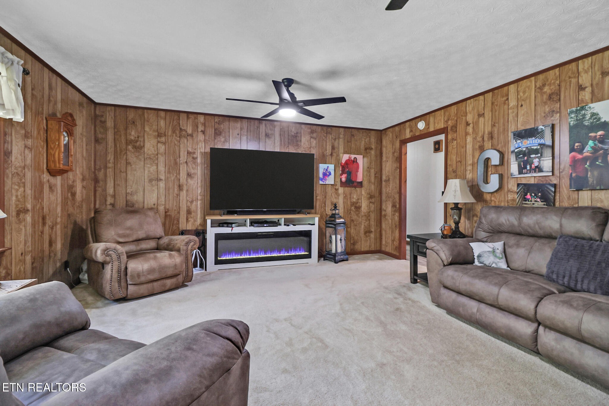 220 Old Gatewood Ford Road Jamestown, TN 38556 - Photo 19 of 57 a living room with furniture and a flat screen tv