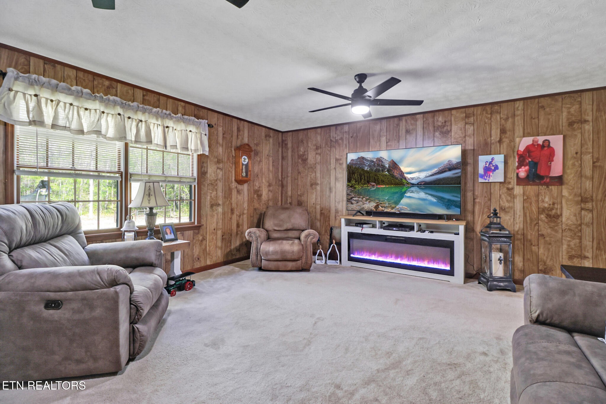 220 Old Gatewood Ford Road Jamestown, TN 38556 - Photo 20 of 57 a living room with furniture and a flat screen tv