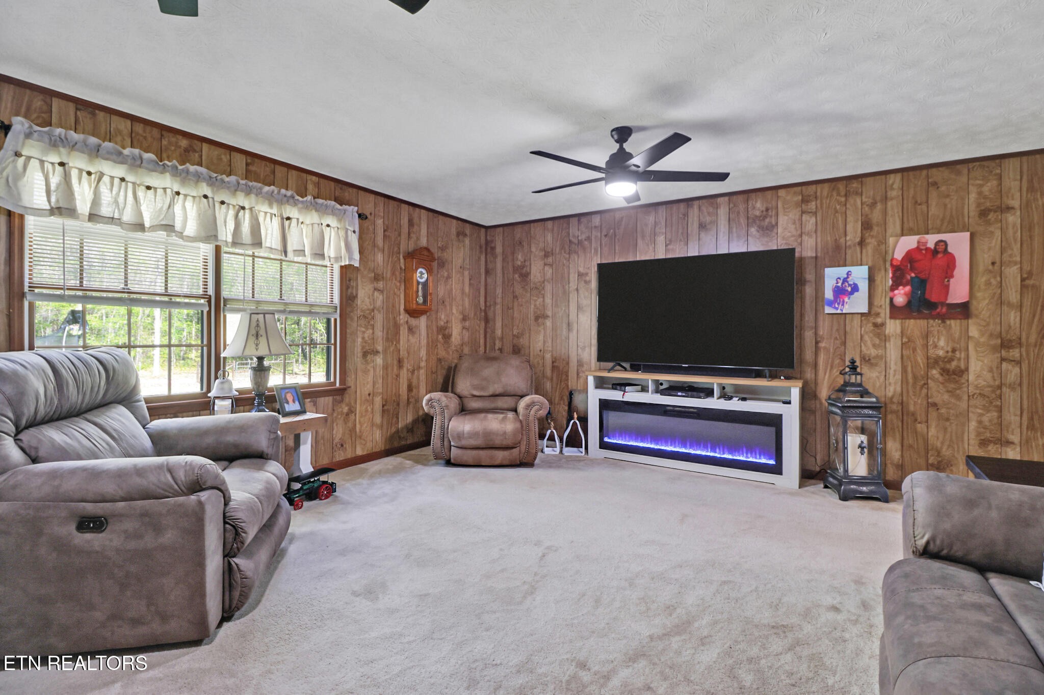 220 Old Gatewood Ford Road Jamestown, TN 38556 - Photo 21 of 57 a living room with furniture and a flat screen tv