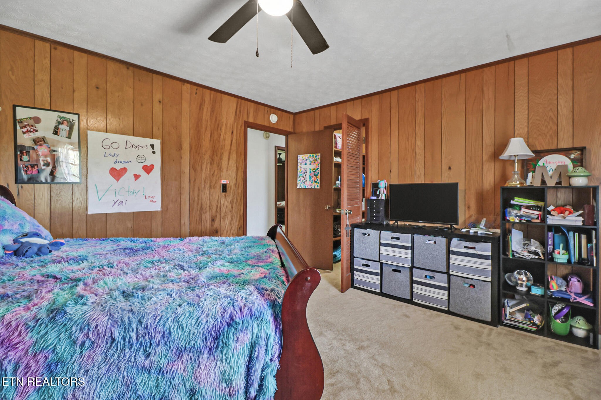 220 Old Gatewood Ford Road Jamestown, TN 38556 - Photo 34 of 57 a bedroom with a bed and furniture
