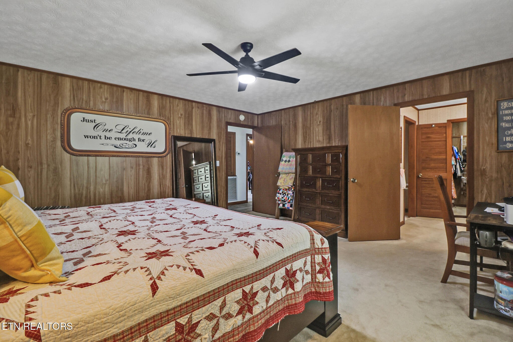 220 Old Gatewood Ford Road Jamestown, TN 38556 - Photo 37 of 57 a bedroom with a bed and a dresser