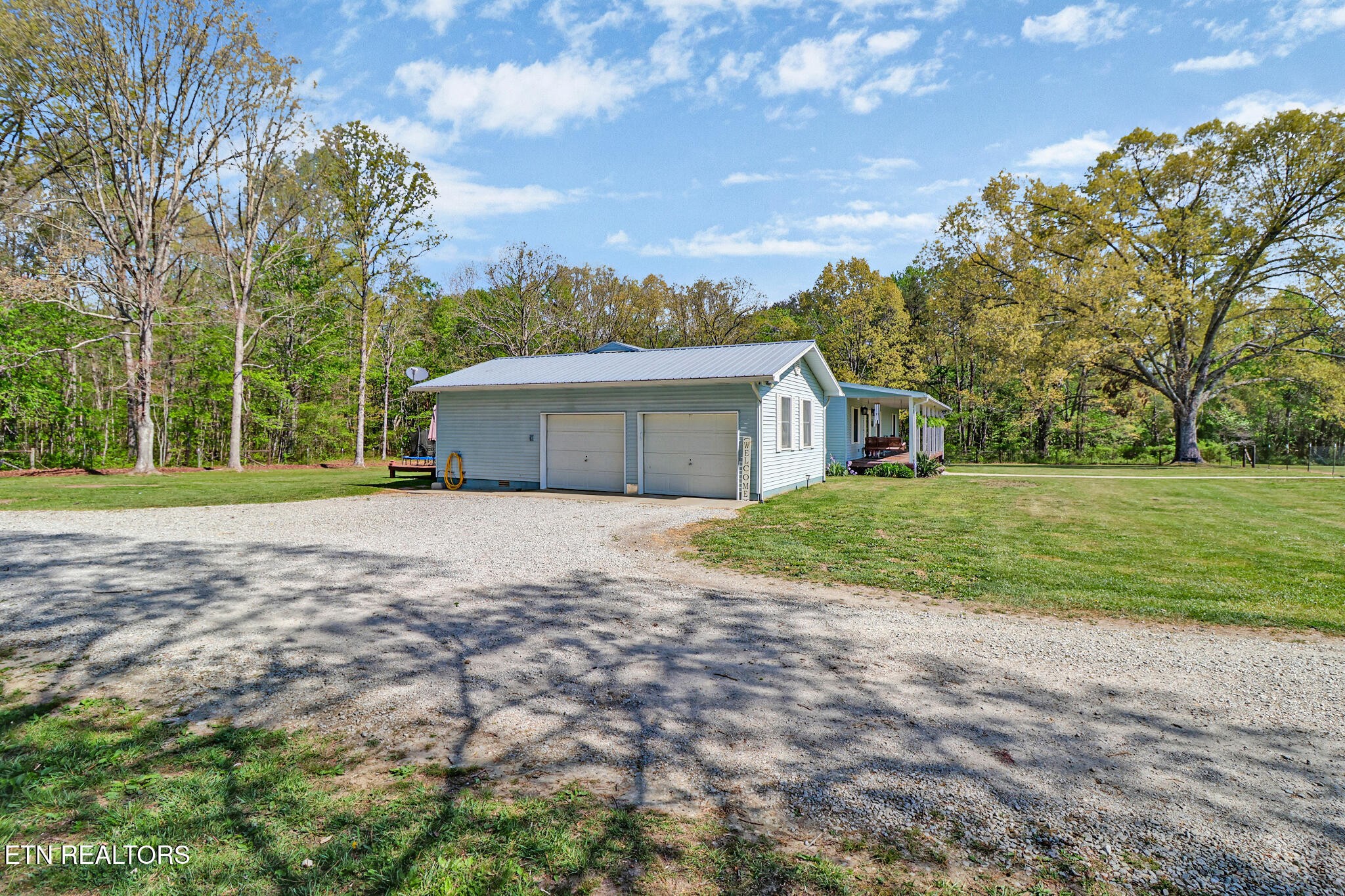 220 Old Gatewood Ford Road Jamestown, TN 38556 - Photo 5 of 57 a front view of house with yard and green space