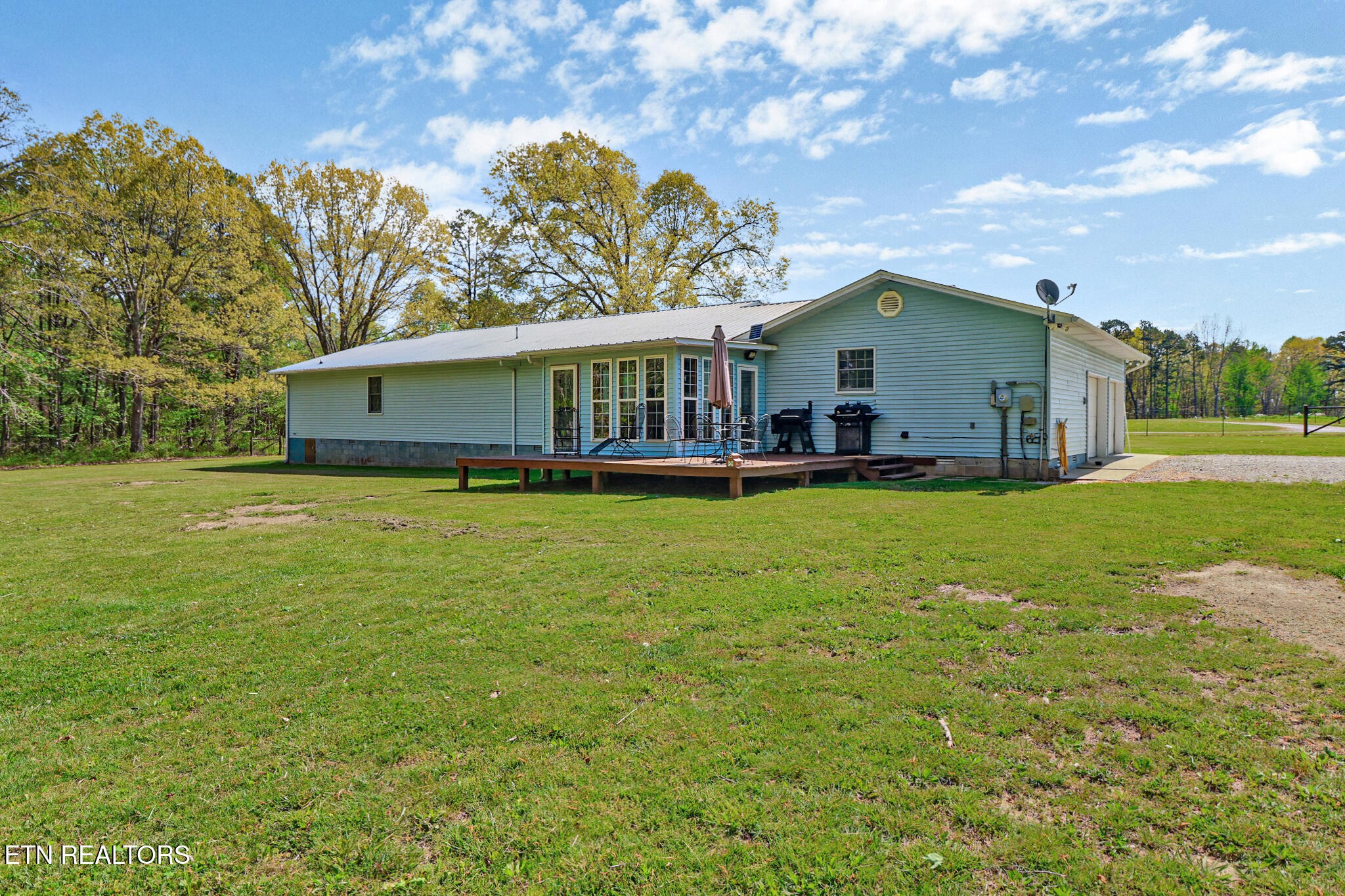 220 Old Gatewood Ford Road Jamestown, TN 38556 - Photo 7 of 57 a front view of house with yard and green space