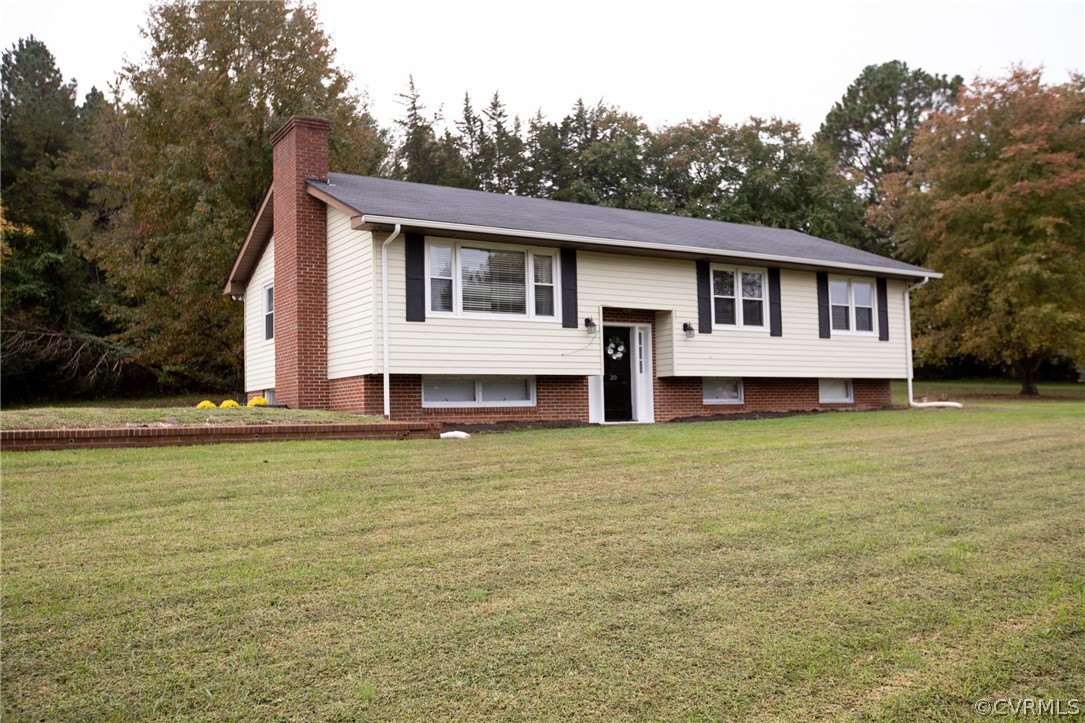 20 Mahan Road Farmville, VA 23901 - Photo 1 of 44 a front view of a house with a garden