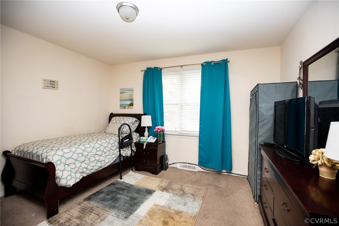 20 Mahan Road Farmville, VA 23901 - Photo 20 of 44 a bedroom with a bed and a flat tv screen
