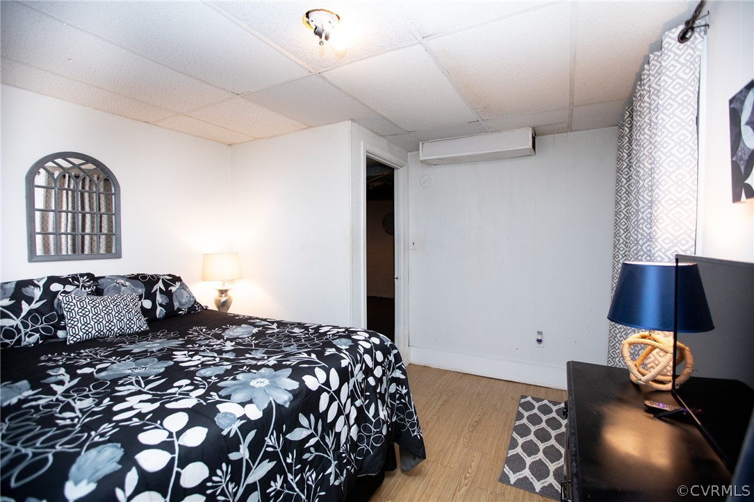 20 Mahan Road Farmville, VA 23901 - Photo 27 of 44 a bedroom with a bed and a lamp